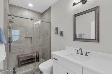 Coastal luxury meets low-maintenance living in this beautifully