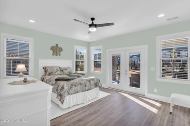 Coastal luxury meets low-maintenance living in this beautifully