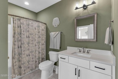 Coastal luxury meets low-maintenance living in this beautifully