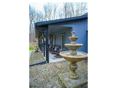 Discover this Cedar ranch walkout home set along the St. Joseph - photo 5