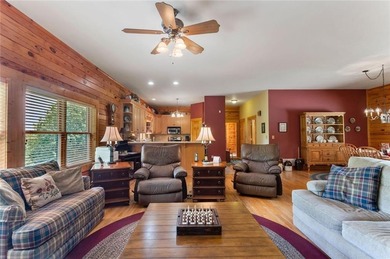 Welcome home to this custom builder's retreat with metal roof &