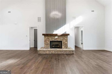Nestled directly on the banks of the Etowah River, this - photo 13