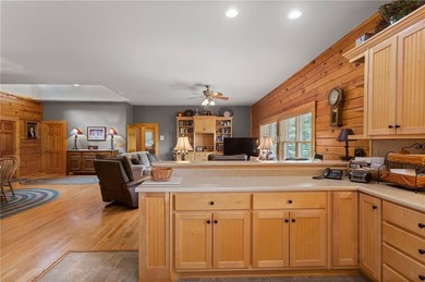 Welcome home to this custom builder's retreat with metal roof &