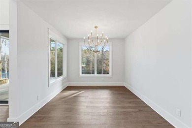 Nestled directly on the banks of the Etowah River, this - photo 21