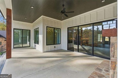 Nestled directly on the banks of the Etowah River, this - photo 41