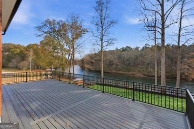 Nestled directly on the banks of the Etowah River, this - photo 43