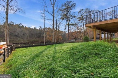 Nestled directly on the banks of the Etowah River, this - photo 44