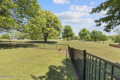 Nestled along the 13th hole of the prestigious Eagle Creek Golf - photo 47