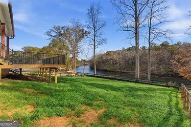 Nestled directly on the banks of the Etowah River, this - photo 48