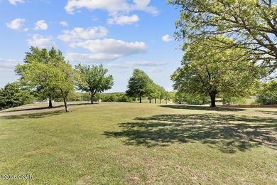Nestled along the 13th hole of the prestigious Eagle Creek Golf - photo 48