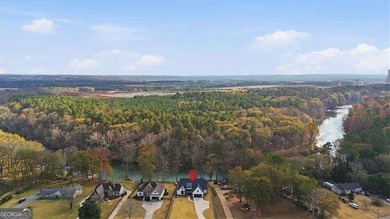 Nestled directly on the banks of the Etowah River, this - photo 50