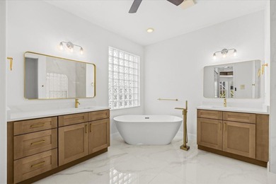 Welcome to this stunning remodeled 4-bedroom, 2.5-bathroom - photo 2
