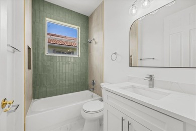 Welcome to this stunning remodeled 4-bedroom, 2.5-bathroom - photo 3