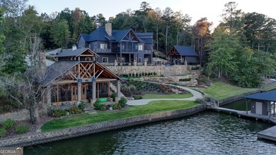 Welcome to this stunning custom-built home perfectly situated on - photo 2