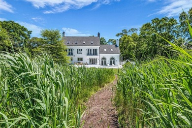 Tucked at the end of a tree-lined drive on a secluded acre, this - photo 43