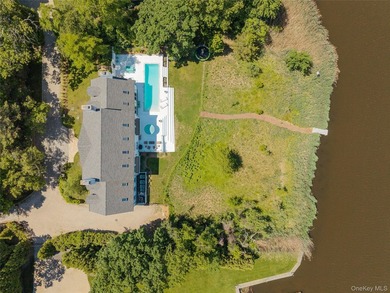 Tucked at the end of a tree-lined drive on a secluded acre, this - photo 44
