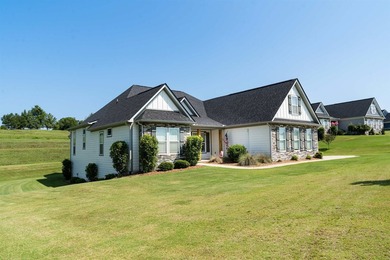Nestled on 1.58 acres in a gated waterfront community, this - photo 2