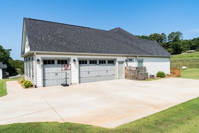 Nestled on 1.58 acres in a gated waterfront community, this - photo 3