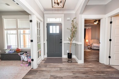 Nestled on 1.58 acres in a gated waterfront community, this - photo 7