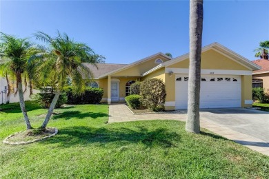 Discover this charming 3-bed, 2-bath waterfront home nestled in - Lake Home For Sale in Tampa, Florida