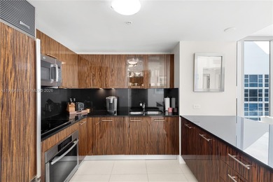 Welcome to Residence 1509 -- a sleek, modern corner unit in the