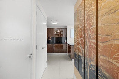 Welcome to Residence 1509 -- a sleek, modern corner unit in the