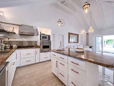 Experience refined Caribbean living in this magnificent villa - photo 28