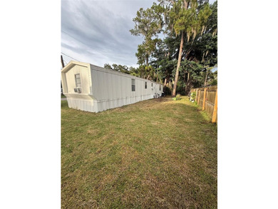 Welcome to this beautifully renovated 3-bedroom, 2 bath single - photo 2