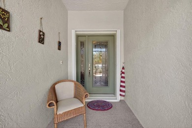 Situated on a large corner lot with lush tropical landscaping - photo 5