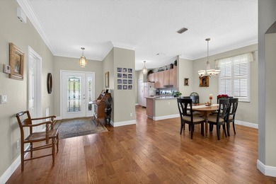 Situated on a large corner lot with lush tropical landscaping - photo 7