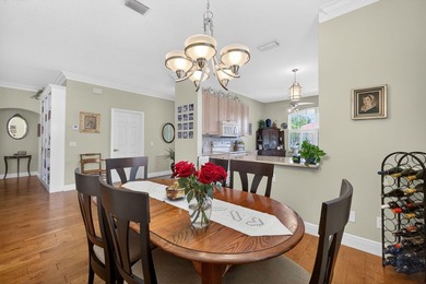 Situated on a large corner lot with lush tropical landscaping - photo 9