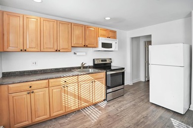 Multi-Family: Located down a tree lined street in the hamlet of - photo 11