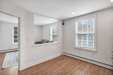 Multi-Family: Located down a tree lined street in the hamlet of - photo 12