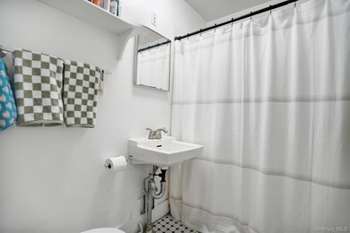 Multi-Family: Located down a tree lined street in the hamlet of - photo 14