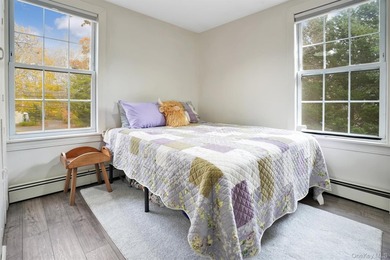 Multi-Family: Located down a tree lined street in the hamlet of - photo 15