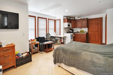 Multi-Family: Located down a tree lined street in the hamlet of - photo 18