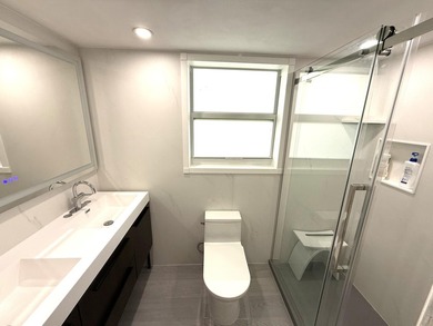 SPACIOUS UPDATED 3-BEDROOM, 2-BATH CORNER GARDEN APARTMENT WITH - photo 9
