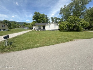 Welcome to 119 Little Creek Lane in LaFollette, TN! This move-in - photo 1