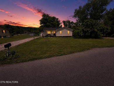 Welcome to 119 Little Creek Lane in LaFollette, TN! This move-in - photo 2