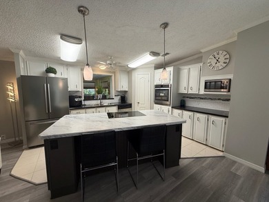 THIS HOME IS ON LEASED LAND WITH AN APPROXIMATE MONTHLY LOT - photo 22