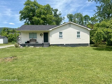 Welcome to 119 Little Creek Lane in LaFollette, TN! This move-in - photo 4
