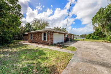 Lake Home For Sale in Deltona, Florida