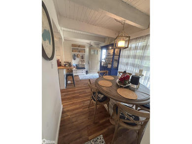 Experience the ultimate lakeside lifestyle in this stunning - photo 4