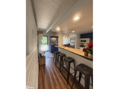 Experience the ultimate lakeside lifestyle in this stunning - photo 5