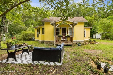 One-of-a-kind home! This 2 bed, 1 bathroom cottage includes a - photo 1
