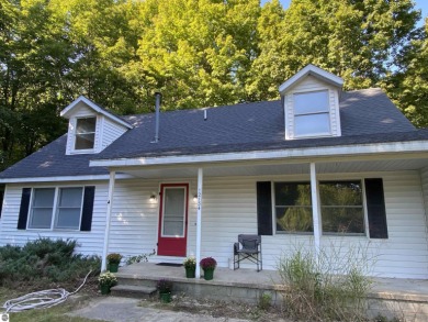Lake Home For Sale in Rapid City, Michigan