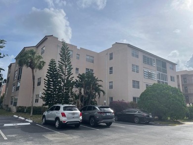 Welcome to Paradise. This two-bedroom, two-bathroom condominium - photo 1