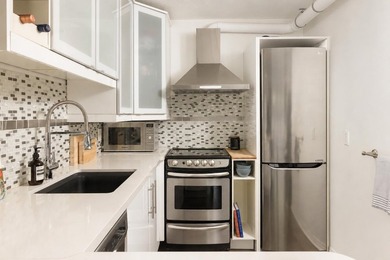 Beautifully renovated 1-bedroom home offers an exceptionally - photo 9