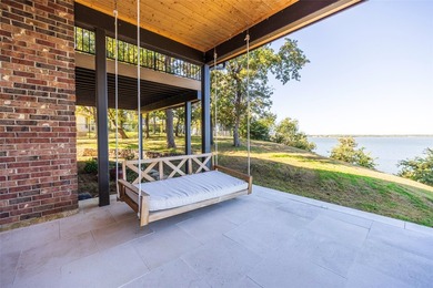 Stunning lakefront home filled with natural light, luxury - photo 32