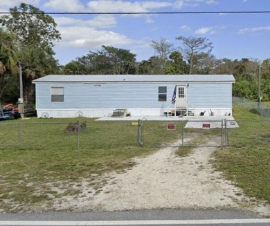 Lake Home For Sale in Okeechobee, Florida